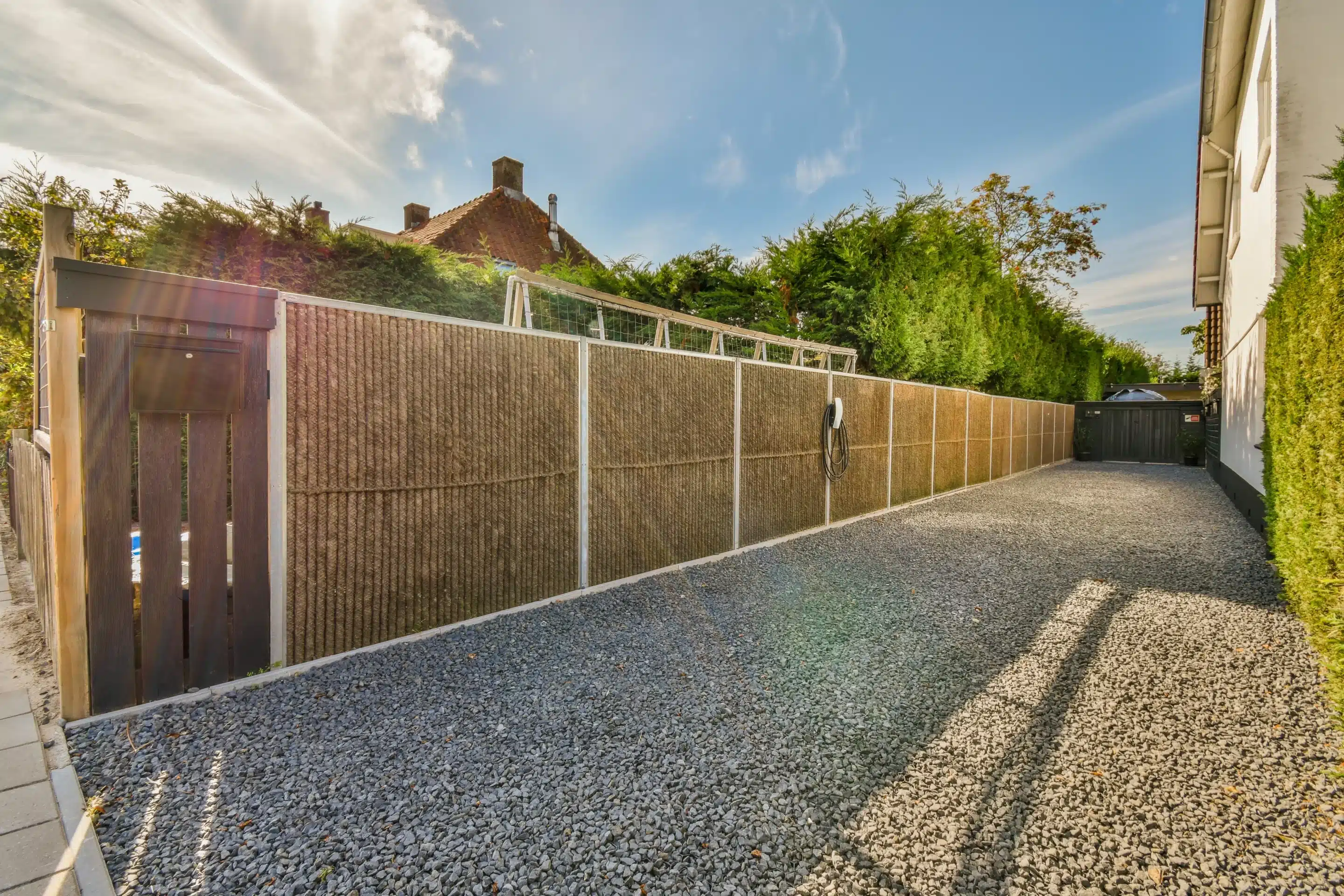 Vinyl Fence Installation Along A Residential Property Line